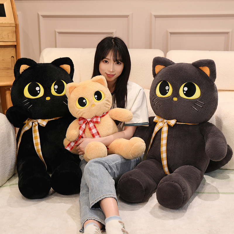 Cat plush toys in black, gray, and light brown, soft stuffed animals with ribbon detail for cuddling and home decor