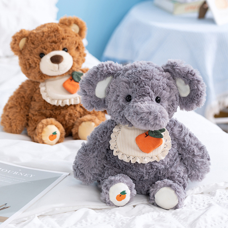 Elephant plush toy from shy animal series on bed soft stuffed animal for hugging bedtime comfort and cozy room decor