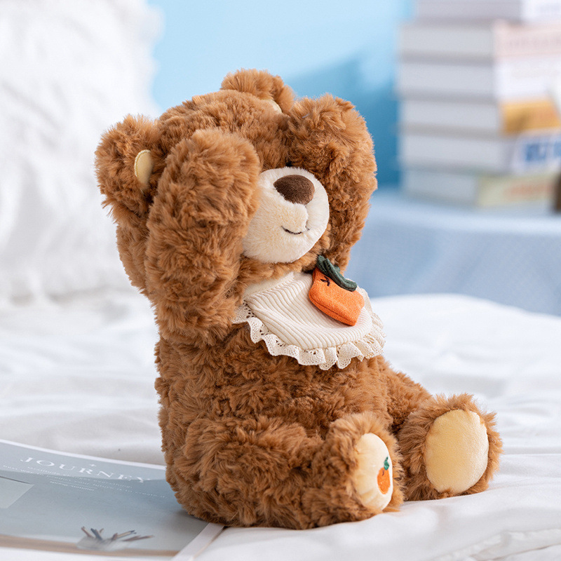 Shy bear plush toy covering eyes soft stuffed animal on bed cozy companion plush for relaxation and bedroom decor