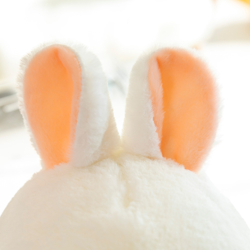 Rabbit plush toy ear detail with soft fluffy texture and light peach inner lining, highlighting gentle material and cute design for a cozy and cuddly experience