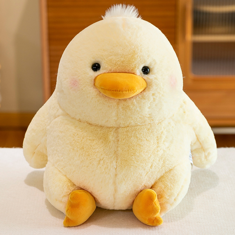 Duck plush toy with soft fluffy texture and bright beak detail, chubby stuffed animal perfect for hugging, relaxing or cozy room decoration
