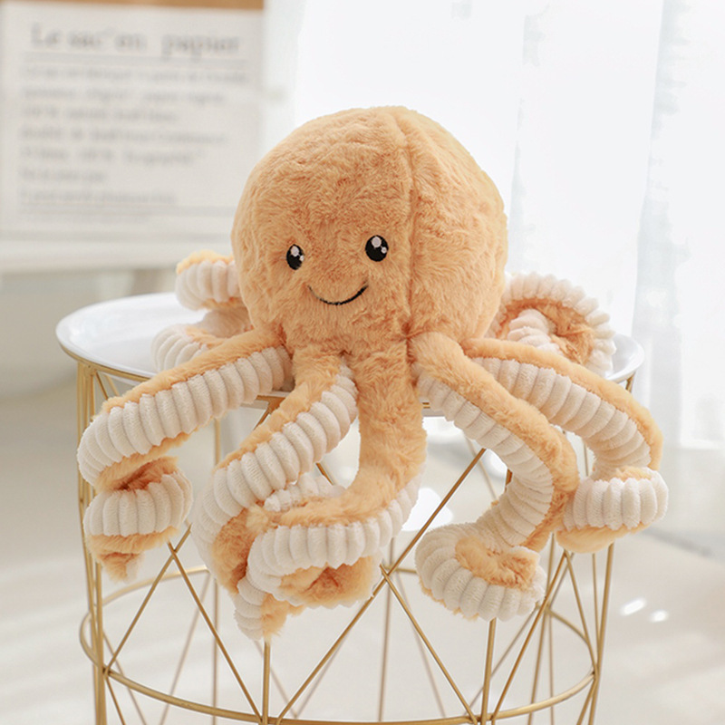 Soft light brown octopus plush toy with plush fabric and flexible tentacles, cozy stuffed animal for relaxing and decor