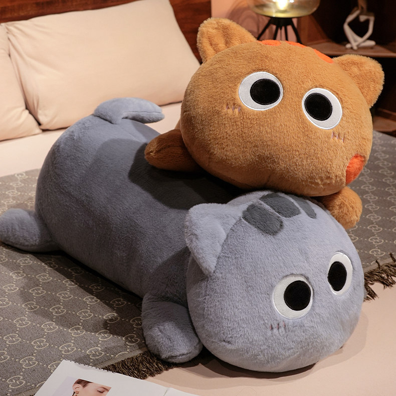 Stacked gray and orange long cat plush pillows, soft stuffed cat body pillows with cute round faces for hugging and cozy home decor