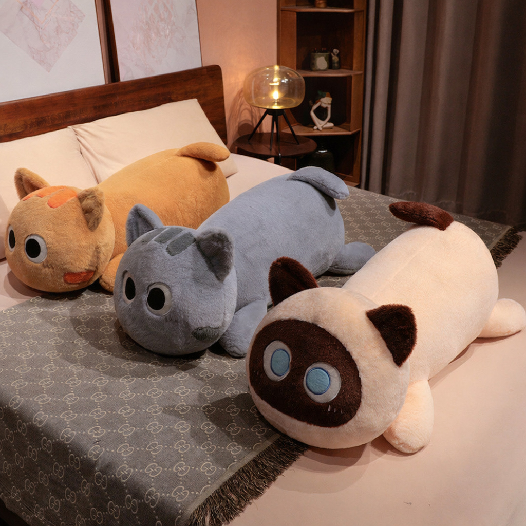 Long cat plush pillows in assorted colors displayed on a bed, cute and soft body pillows for relaxing, sleeping, and home decor