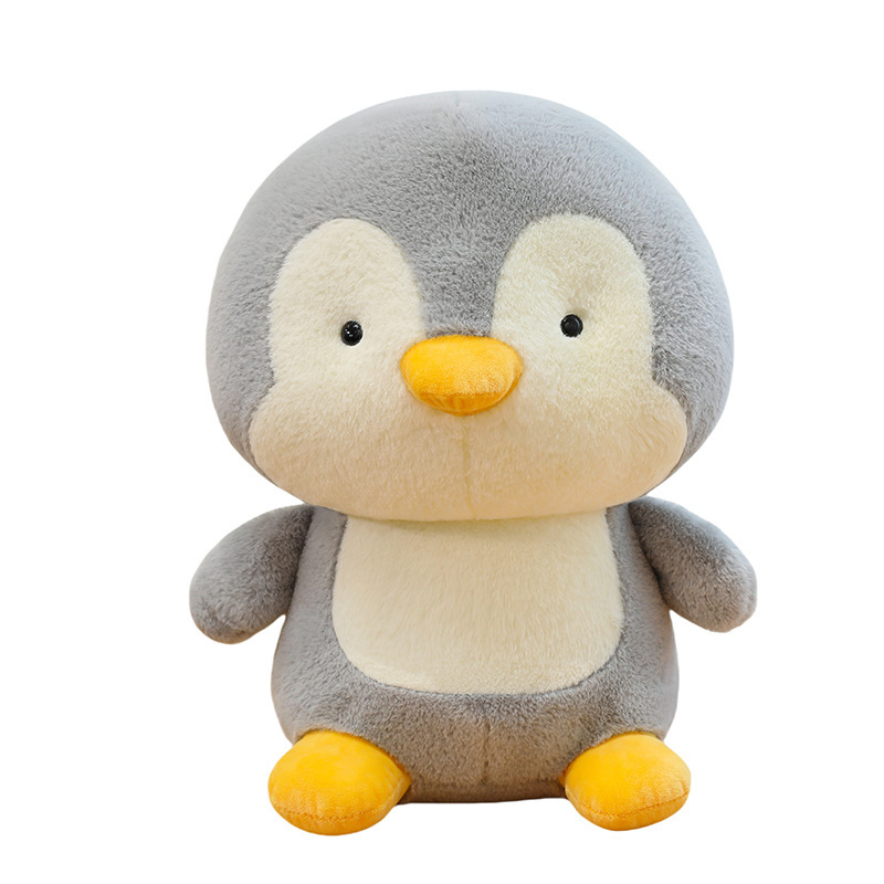 Penguin plush toy with soft grey and white plush fabric, rounded shape and cute expression, perfect for cuddling and cozy room decor