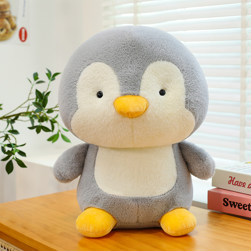 Penguin plush toy with soft plush texture and cute rounded design, perfect for hugging, relaxing and decorating cozy spaces