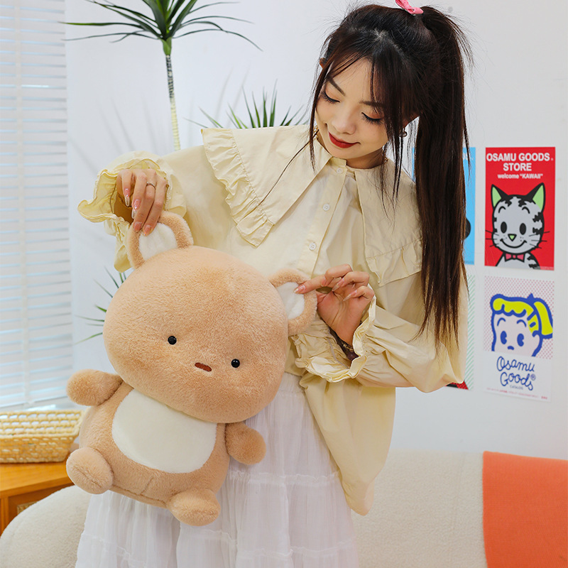 Bear plush toy with soft plush texture and rounded design, a cuddly companion perfect for relaxing and adding warmth to cozy spaces