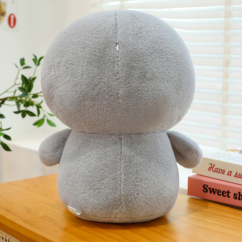 Back view of penguin plush toy with soft plush texture and neat stitching, highlighting its rounded shape and well-crafted design