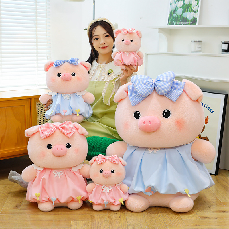 Bubble pig plush toy set in pink and blue with bow dress, shown in multiple sizes, soft plush fabric for cuddling and decorating sofas, beds, and rooms