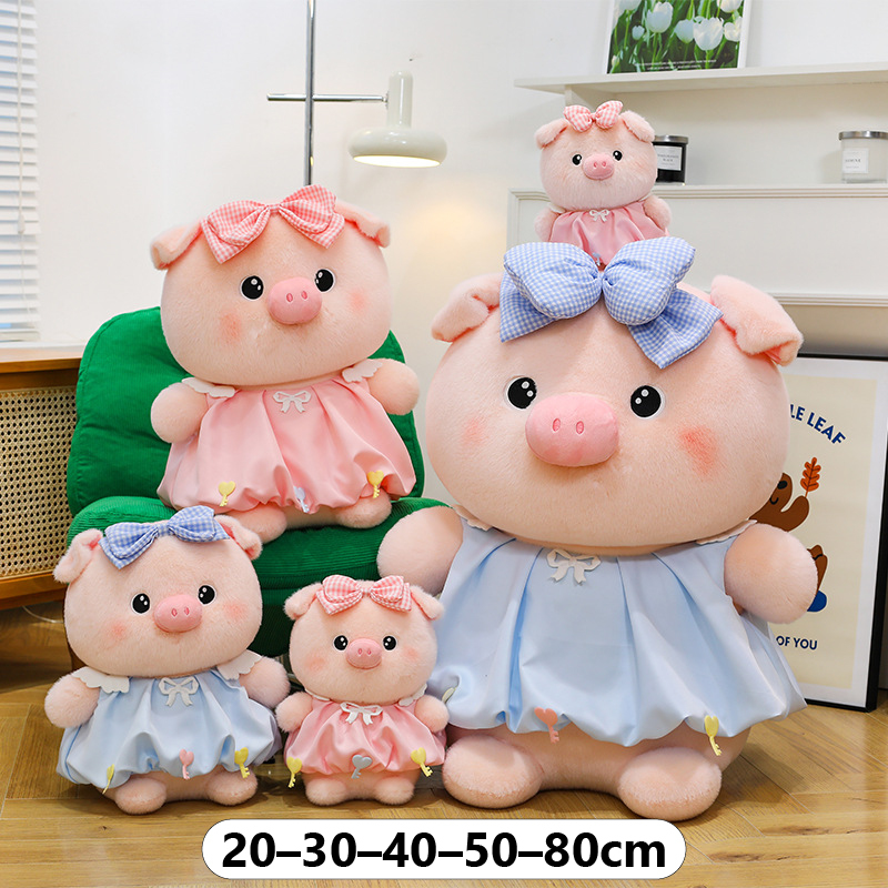 Bubble pig plush toy in pink and blue with bow dress, shown in 20 cm 30 cm 40 cm 50 cm and 80 cm sizes on chair and floor, soft plush fabric for hugging and home decor