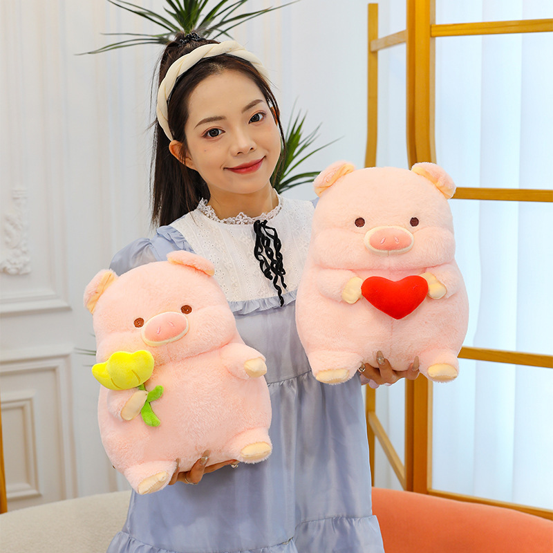 Pig plush toy with heart and flower designs soft stuffed animal pillows for hugging and gifting