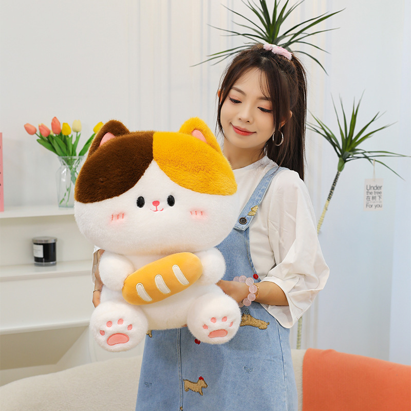Baguette cat plush toy in warm home environment showcasing soft plush fabric rounded shape and suitability for hugging and decor