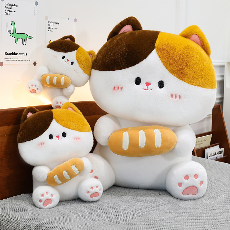 Baguette cat plush toy placed on bed with cozy indoor setting highlighting soft texture cute design and decorative home use