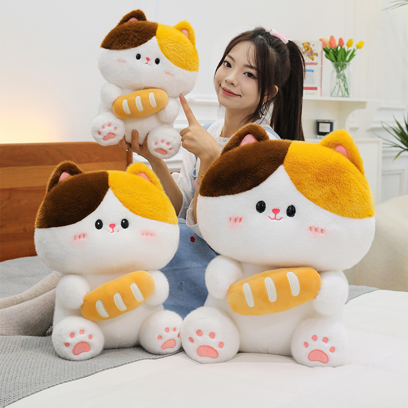 Baguette cat plush toy in different sizes showing soft plush fabric and cuddly shape suitable for hugging relaxing and home decor