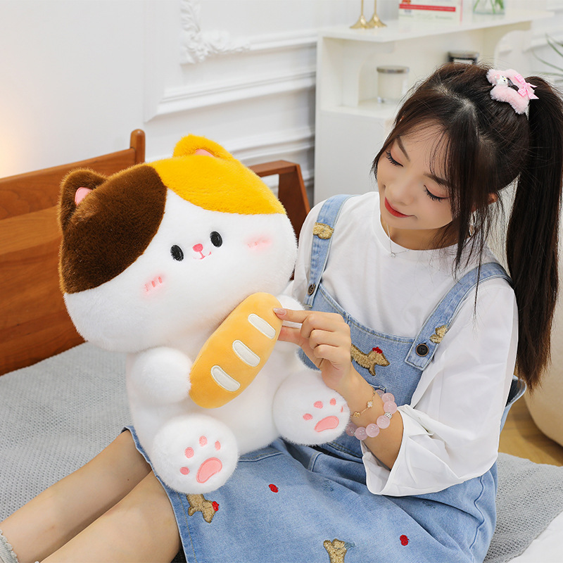 Baguette cat plush toy with soft plush fabric and cute bread design shown in cozy home setting highlighting texture and hugging comfort