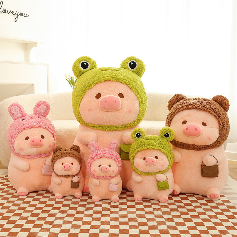Pig plush toy in animal costume with soft plush texture, shown in different sizes and cute animal styles for hugging, decoration, and cozy spaces