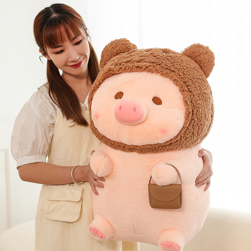 Pig plush toy in bear costume with fluffy texture and comfortable feel, soft stuffed animal for relaxing, hugging, and cozy everyday use