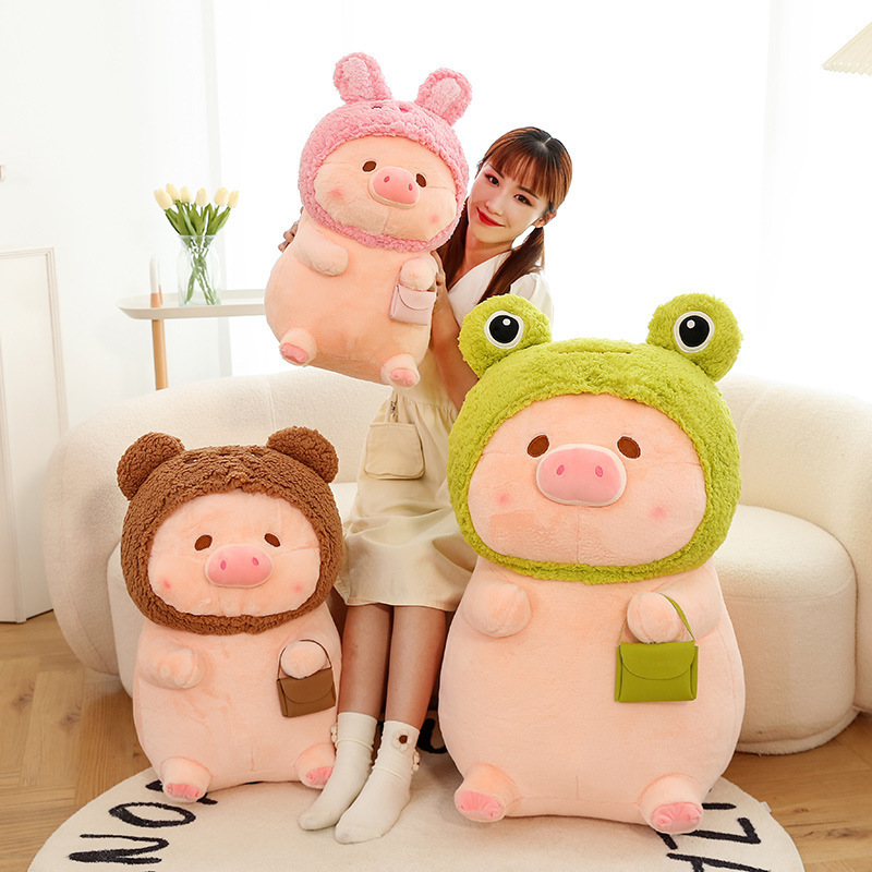 Pig plush toy in animal costume available in multiple sizes and styles including frog, bear, and rabbit designs, soft stuffed plush for cuddling, gifting, and home decoration