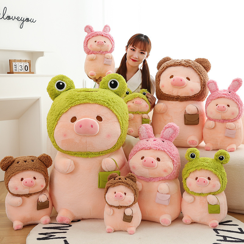 Pig plush toy in animal costume featuring frog, bear, and rabbit designs in multiple sizes, soft stuffed toy for home decor and cozy display