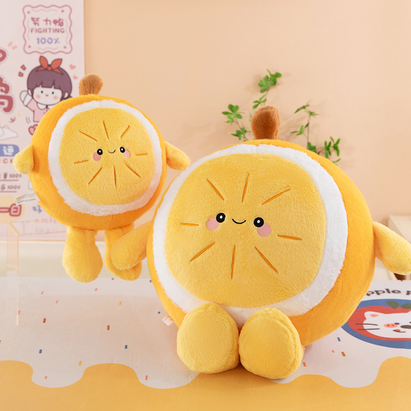 Orange plush pillow shown in two sizes with soft shape and smiling expression, lightweight cushion suitable for hugging, decorating, and everyday comfort
