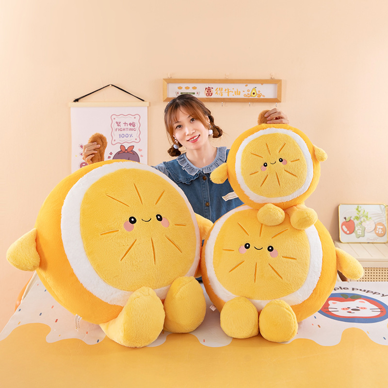 Orange plush pillow set in multiple sizes displayed together, featuring smiling fruit design, soft cushion for hugging, decorating, and cozy home use
