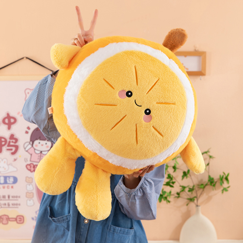 Orange plush pillow with smiling face, soft round shape and small arms and legs, cute fruit cushion for hugging, relaxing, and home decor
