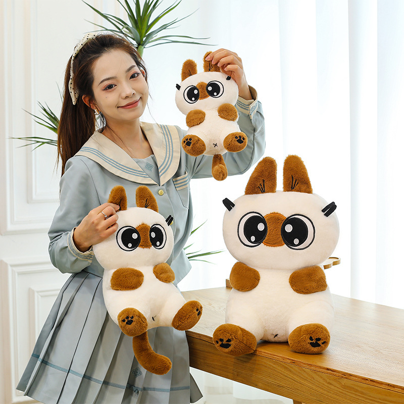 Soft Siamese cat plush toy with big eyes and smooth plush texture, ideal for cuddling relaxing and adding a cozy touch to any space