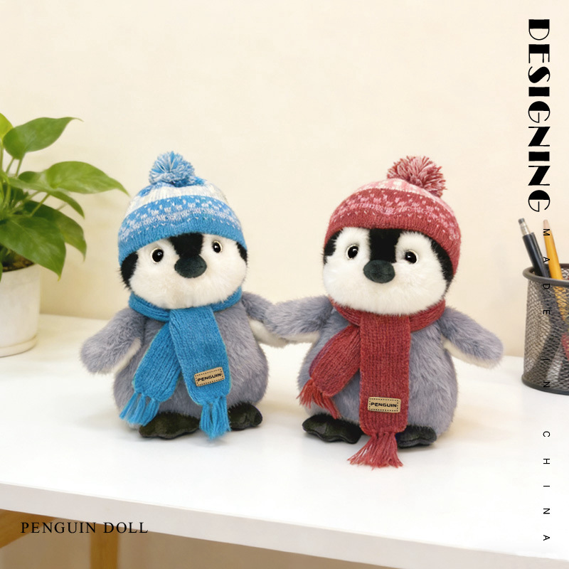 Winter penguin plush toys with blue and red scarf on desk cute soft stuffed animals cozy home decor display