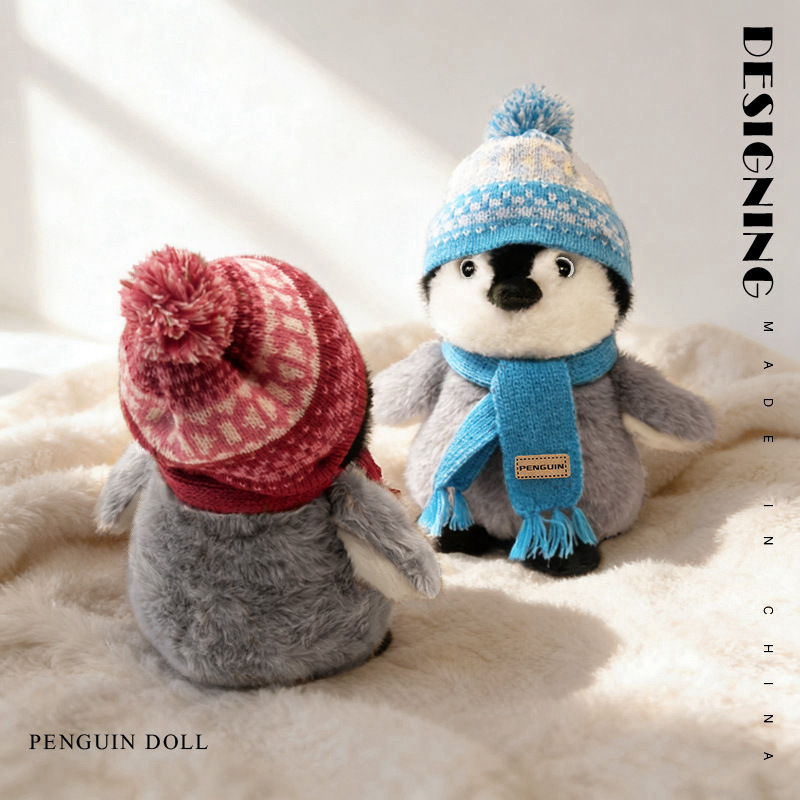 Winter penguin plush toy front and back view with knitted hat and scarf soft stuffed animal detail display