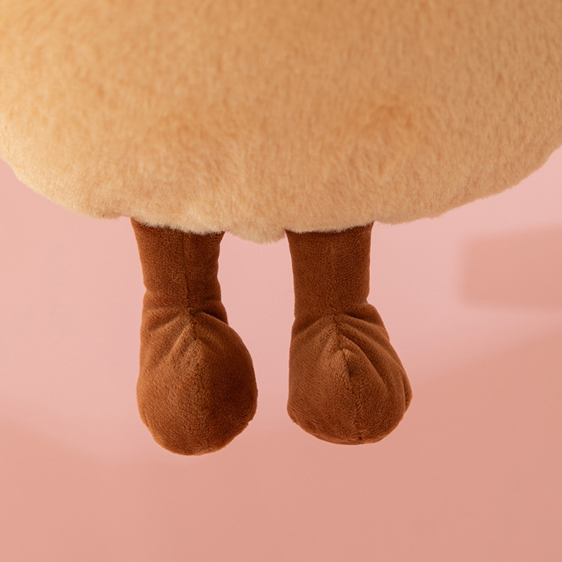 Chef baguette plush pillow bottom detail with soft plush legs and smooth fabric texture for added character
