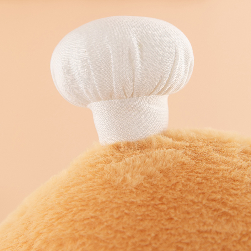 Chef baguette plush pillow chef hat detail close up with soft fabric texture and playful design accent