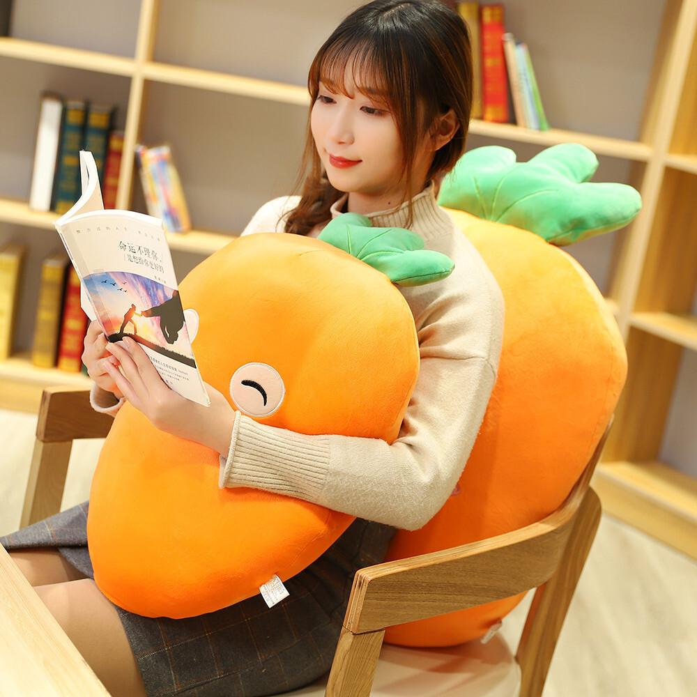 Carrot plush pillow used for hugging while reading, soft plush cushion for relaxing on chair with cozy support