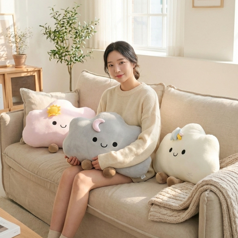 Star cloud plush pillow in soft pastel colors on a cozy sofa, cute cloud cushion with star and moon details for home decor