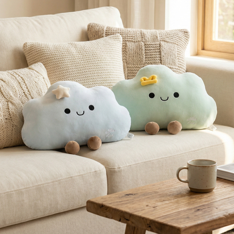 Star cloud plush pillow in blue and green on sofa, soft cushion for relaxing and cozy living room decor