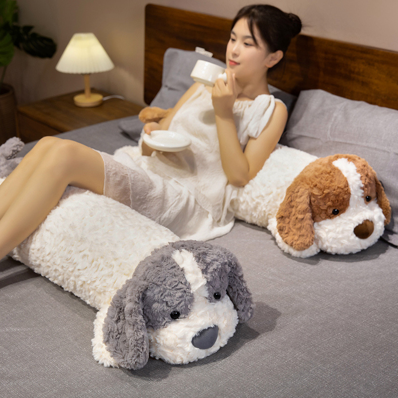 Lying dog long plush pillow as a comfortable body cushion on bed, ideal for lounging, resting and adding cozy home decor touch