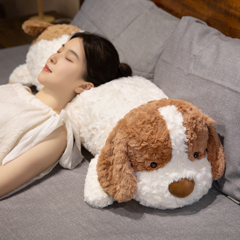 Lying dog long plush pillow used as a soft head and body support cushion on bed, plush fabric pillow for resting and relaxing