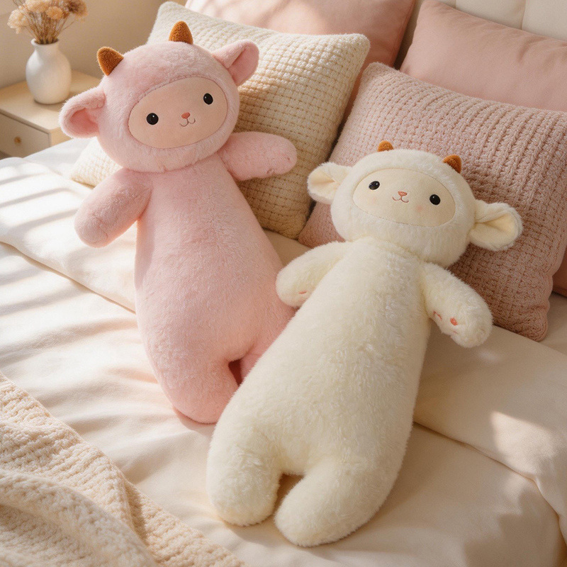 Lamb plush pillow on bed in pink and white, soft cozy cushion for sleeping, lounging and home decor