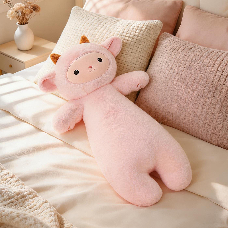 Pink lamb plush pillow on bed, soft hugging cushion for sleeping, relaxing and cozy home styling