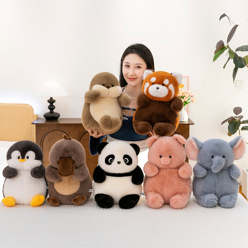 Animal stuffed plush toys including pig, elephant, red panda, panda, penguin, seal and platypus, soft and cuddly stuffed toys for hugging and home decor