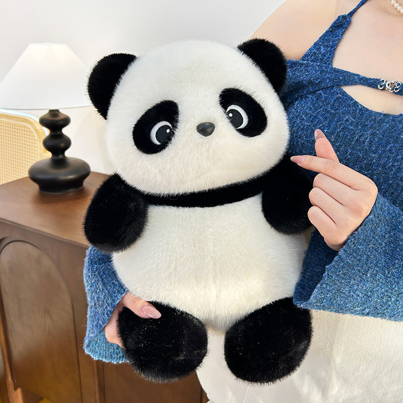Panda plush toy held close, soft fluffy texture with rounded design, cuddly stuffed animal for comfort, hugging and cozy home decor