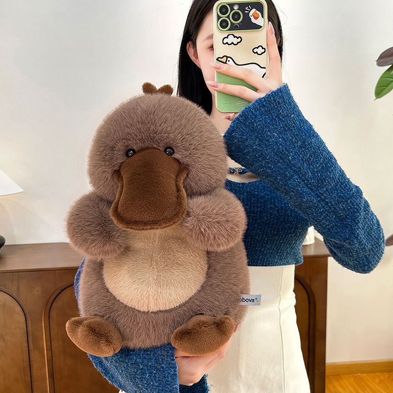 Platypus plush toy with soft fluffy texture and unique beak design, cute stuffed animal for hugging, decor and cozy comfort