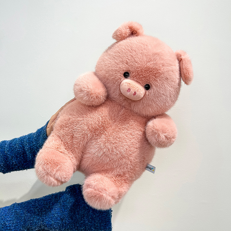 Cute pig plush toy with soft fluffy fabric, rounded design stuffed animal for cuddling, relaxing and decorative use