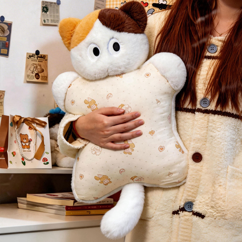 Calico cat plush pillow held in arms, soft squeezable cushion with cozy texture for lounging and home comfort