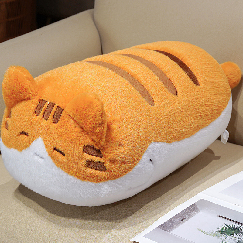 Orange cat plush pillow with soft fluffy fabric and rounded shape, ideal for hugging, relaxing, and cozy home decor