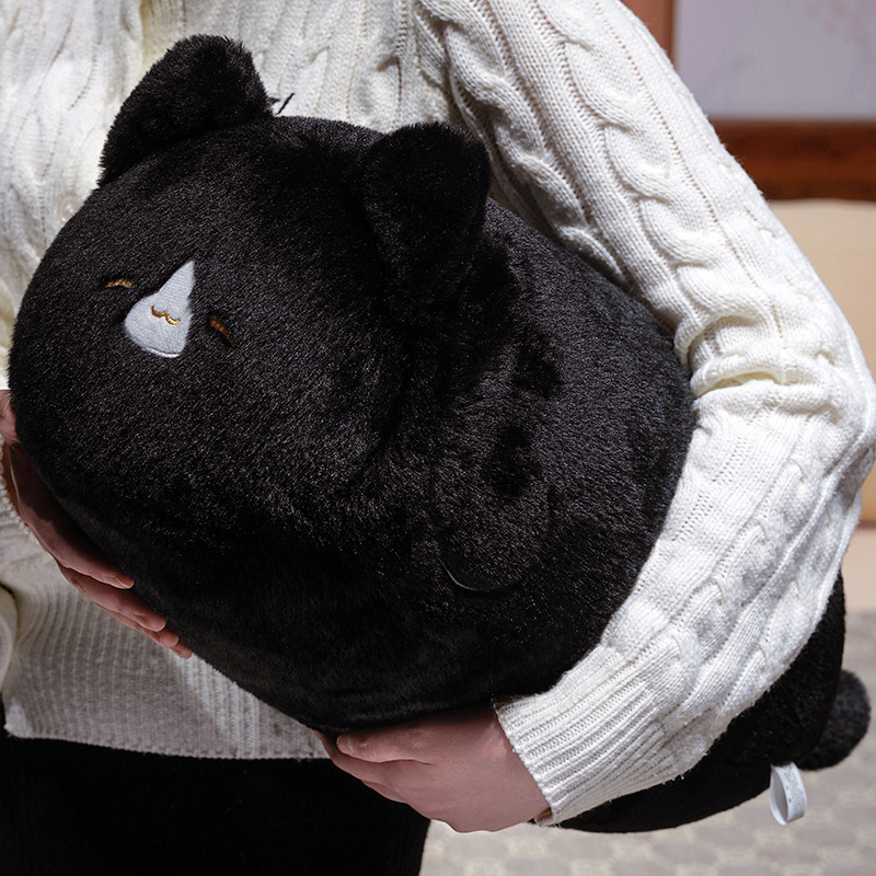 Black cat plush pillow with soft smooth fabric and rounded shape, designed for hugging and cozy comfort during rest or lounging
