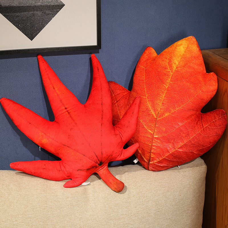Leaf plush pillows in red maple and hawthorn designs, featuring realistic leaf shapes and soft plush texture for decorative home use