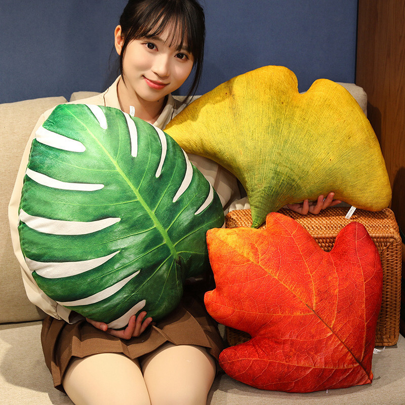 Leaf plush pillows including monstera, ginkgo, and hawthorn designs, soft and comfortable for hugging, lounging, and home decor