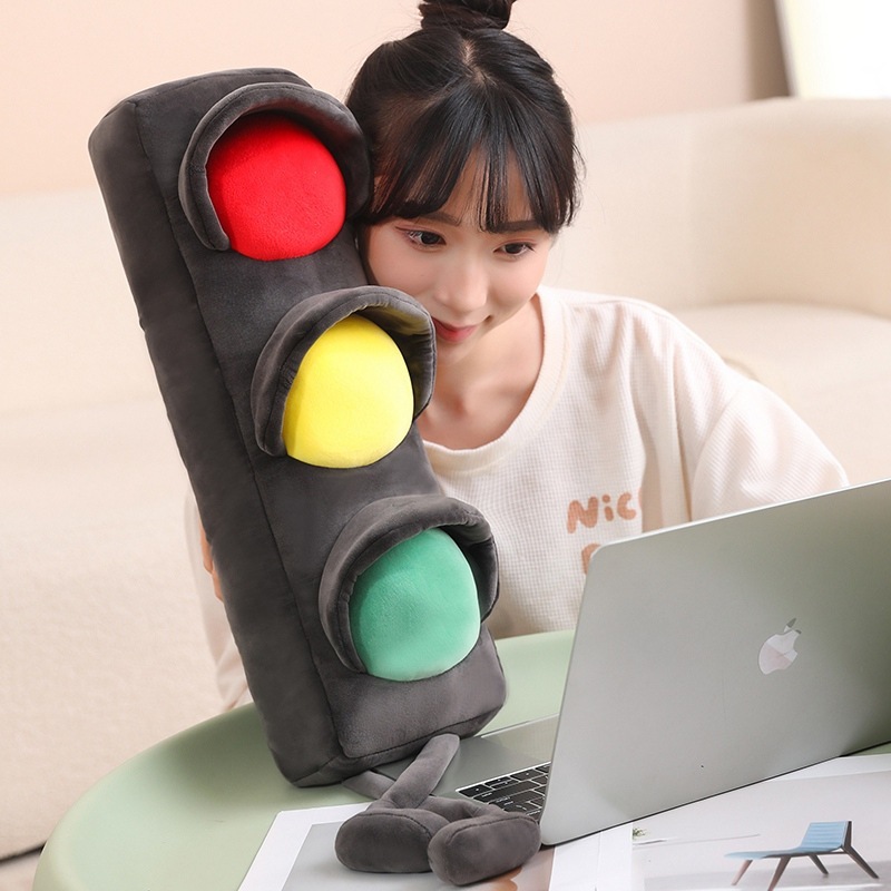 Traffic light plush pillow used as soft support while working, long cushion with colorful signal lights, cute plush pillow for desk, relaxing and home decor