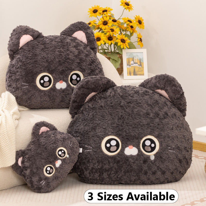 Cartoon cat head plush pillow in Black Devon Rex Cat design showing three sizes on sofa, soft fluffy backrest cushion for bed and home decor