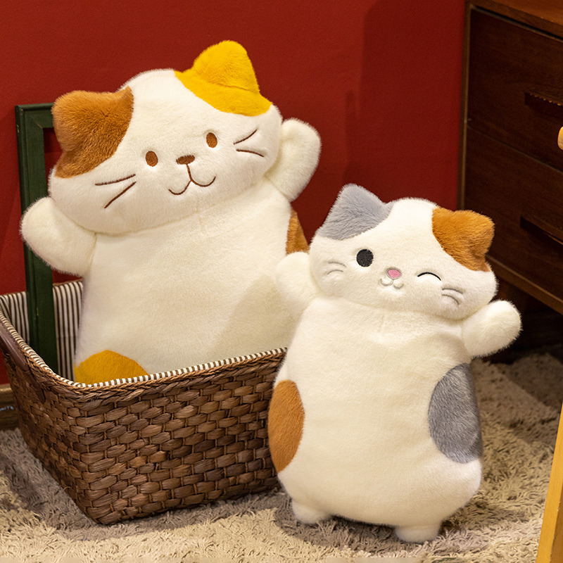 Calico cat plush pillow displayed in woven basket, cute and fluffy cat cushion for cozy home decor, ideal for decorating, gifting, and relaxing